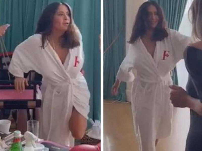 Hamam xalatında rəqs edən Salma Hayekin dəfələrlə sinəsi açıldı - VİDEO