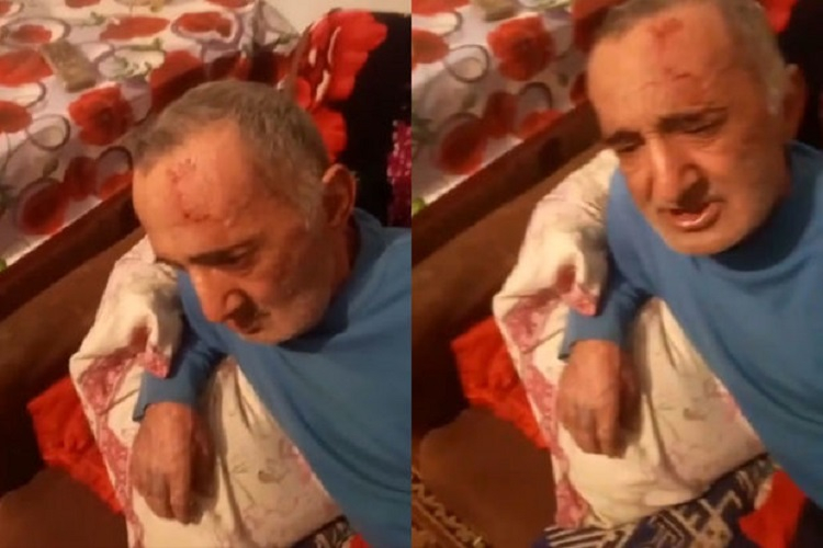 Bakıda oğul atasını döydü, qardaşı isə lentə aldı (VİDEO)
