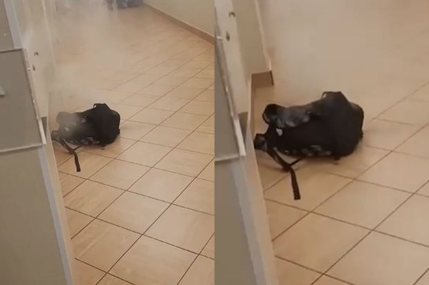 Rusiyada məktəblinin bel çantasında olan mobil telefon partlayıb - VİDEO