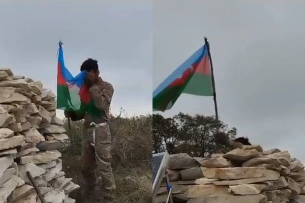 Əsgərimiz Xocalıya Azərbaycan Bayrağını sancdı (VİDEO)