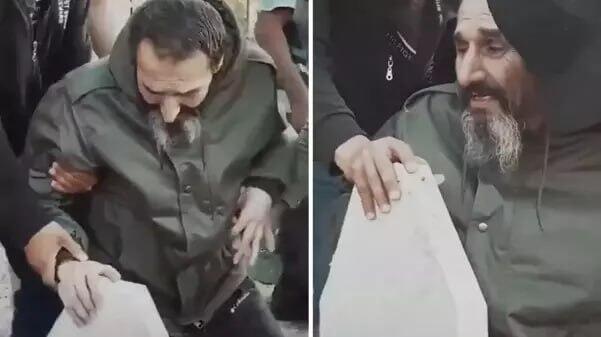 Əsəd tərəfindən öldürülən oğullarının məzarı başında görüntüsü ürək dağladı - VİDEO