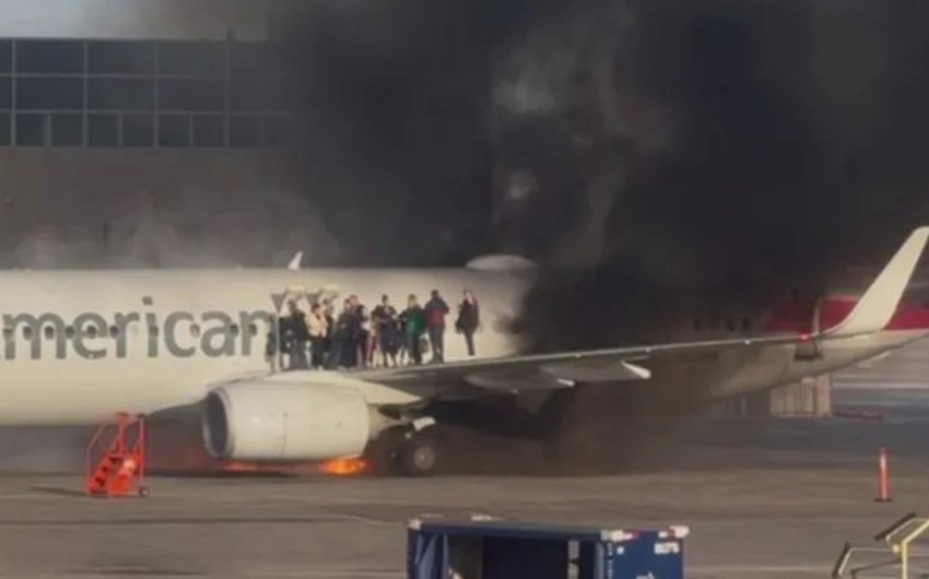 Denver aeroportunda təyyarənin göyərtəsində yanğın baş verib, 12 nəfər xəsarət alıb