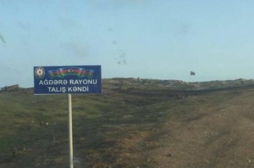 Azad olunmuş torpaqlarda yol nişanı