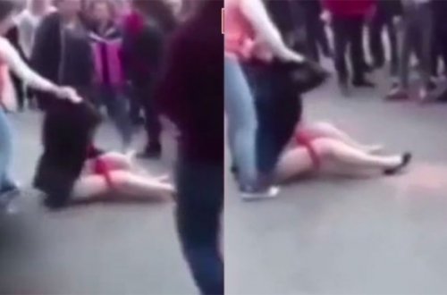 Qadın sevgilisini əlindən alan həmcinsini küçədə, hər kəsin gözü qarşısında soyundurdu