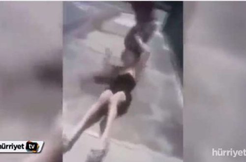 Əri ilə gəzən qadını körpüdən atdı - VİDEO (16+)