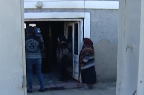 Borclu borc verənin evini yandırmaq istədi