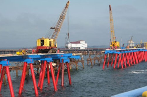 Tufanın dənizə atdığı neftçilərdən birinin meyiti tapıldı