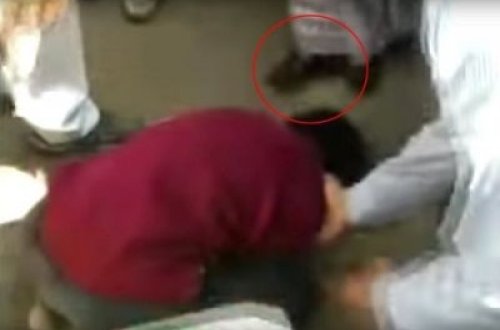 Qadın nazir 1 qəpiyə görə uşağı təpiklədi