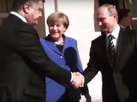 Merkel Poroşenko və Putini görün, nəyə məcbur etdi