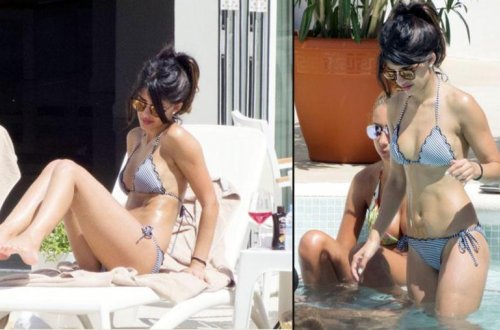 Aktrisa hovuzda dincələrkən -