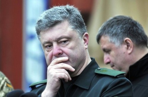 Poroşenko Varşavaya cırıq corabla gəldi