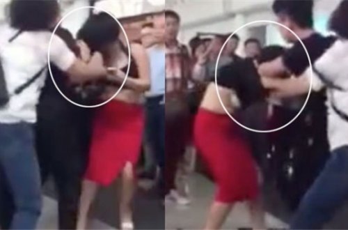 Qadın ərinin sevgilisini hava limanında döyüb soyundurdu VİDEO