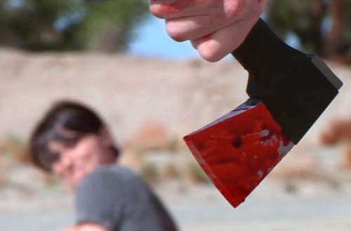 Ər arvadını baltalayıb öldürdü - Bayılda