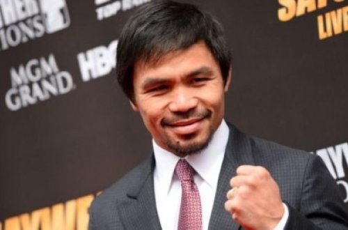 Boksçu sərvətinin yarsını kasıblara bağışladı - FOTOLAR