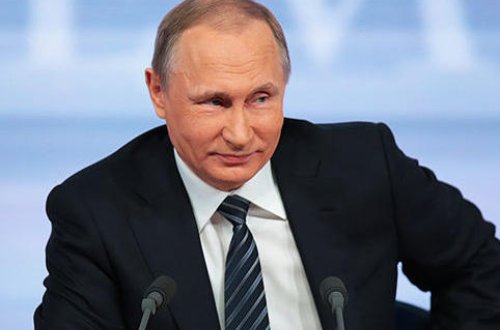 Putin cədvələ baxıb, 