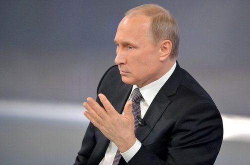 Karlov öldürülərkən silahlı mühafizəçisi harda idi? - Putin açıqladı