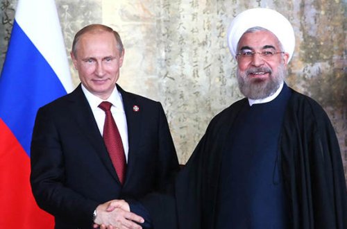 Putin Ruhani ilə danışdı