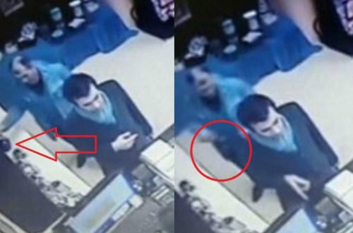 Bakıda mağazadan bahalı spirtli içki oğurlayanlar kameraya düşdülər - VİDEO