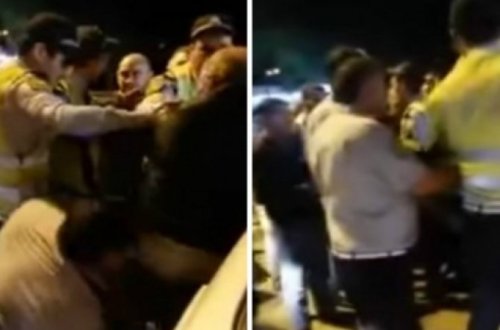 Sürücü ilə yol polisi əməkdaşları arasında dava - VİDEO