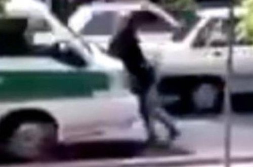 İnanılmaz olay: Qız özünü polis maşınının önünə atdı - VİDEO