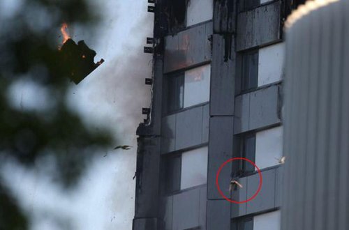 İNSANLARIN YANAN BINADAN ÖZLƏRINI ATMA ANI - VİDEO