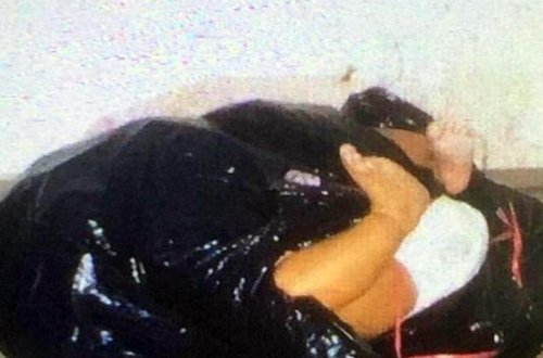 Ana 5 aylıq körpəni qara paketə büküb pəncərədən asdı: 