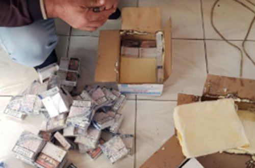 Yağ qutusundan papiros tapıldı