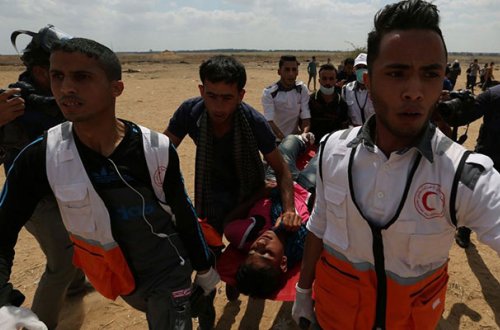 İsrail əsgərləri etiraz edən fələstinliləri atəşə tutdu - 1 ölü, 28 yaralı