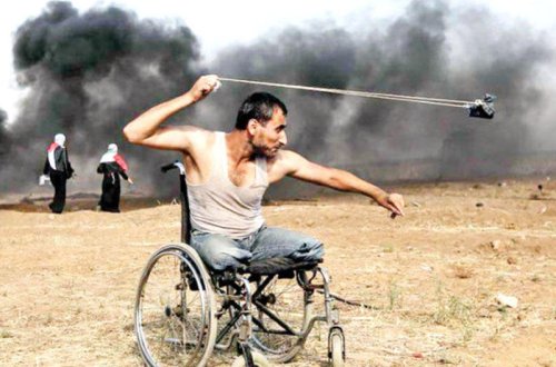 Etiraz aksiyalarına əlil arabasında qatılan müsəlman da öldürüldü - FOTO