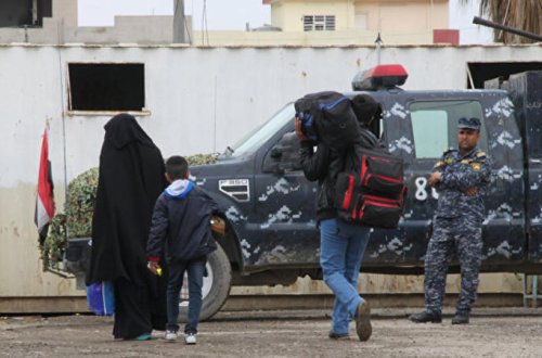 İraqda polislə etirazçılar arasında toqquşmalar baş verdi