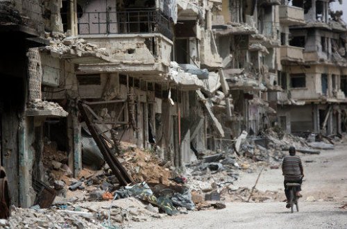 Rəqqada ABŞ koalisiyası qurbanlarının minlərlə cəsədi aşkarlandı - VİDEO