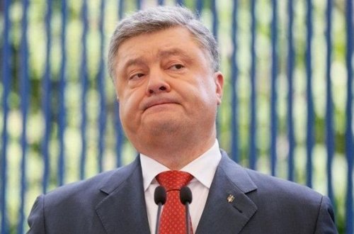 Poroşenko dövlətə xəyanətdə ittiham olundu