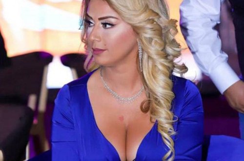 Roza sinəsi açıq ŞƏKLİNİ silmək məcburiyyətində qaldı