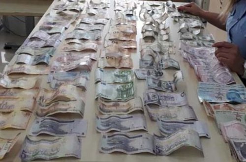 Azərbaycanlı dilənçinin üstündən çıxan pullar HAMINI ŞOKA SALDI - FOTO