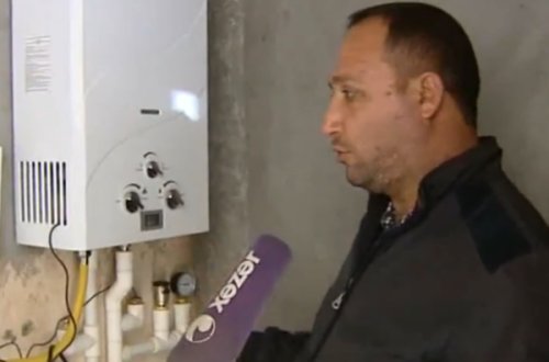 Suqızdırıcı sobadan kombi kimi istifadə edilir - qaz və elektrik sərfiyyatı azdır - VİDEO