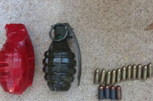 Azərbaycanda qəribə hadisə: evin həyətini qazanda silah anbarı tapdı