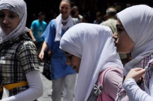 Daha bir ölkədə hicab QADAĞAN EDİLDİ, ərəb əlifbası yığışdırıldı - FOTO