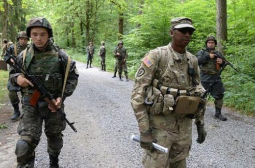 ABŞ və Avropadan yüzlərlə hərbçi Ukraynaya GƏTİRİLDİ: Rusiya ilə MÜHARİBƏ BAŞLAYIR - FOTO