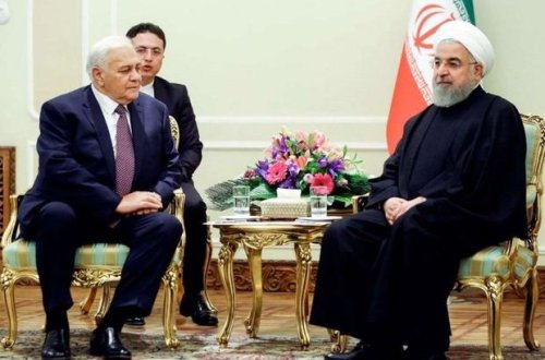 Oqtay Əsədov Ruhani ilə görüşdü