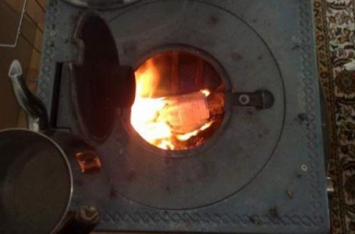 Sərxoş nənə və baba 11 aylıq nəvələrini sobada YANDIRDI