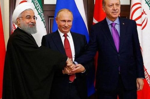 Putinin Ərdoğanın sualına cavabı İran prezidentini güldürdü - VİDEO