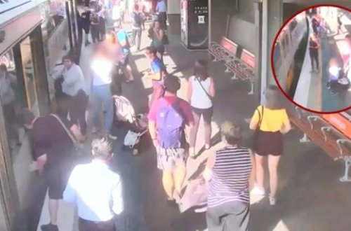 Uşağın qatarın relsləri arasına düşmə anı ANBAAN KAMERALARDA - VİDEO