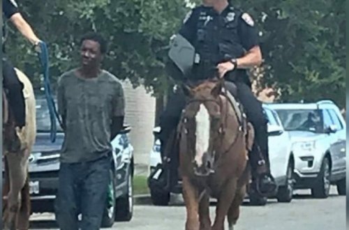 Полицейские провели по городу чернокожего на веревке и извинились