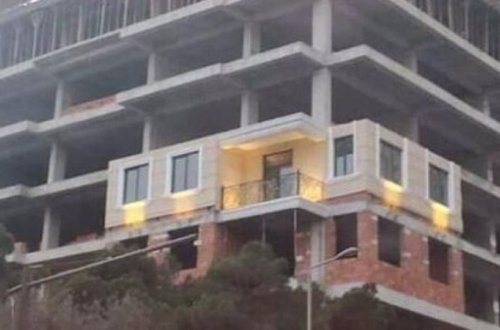 Bakıda tikinti gedən binada yaşayış var (FOTOLAR)
