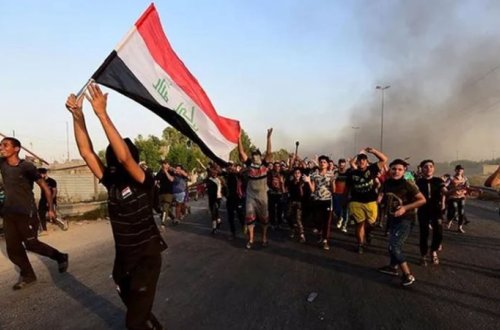 İraqda üç millət vəkilinin evinə od vuruldu