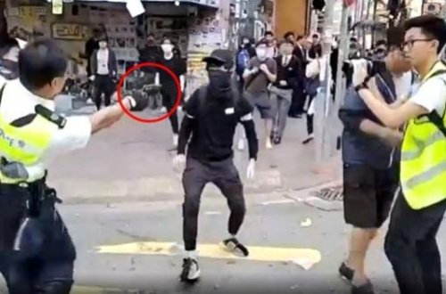 Polis canlı yayımda etirazçını güllələdi - VİDEO