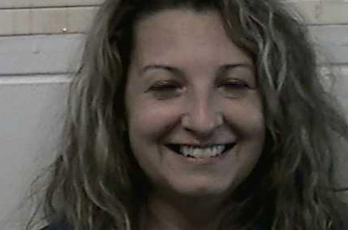 Ərini öldürən qadın polis kamerasına gülərək poz verdi - FOTO