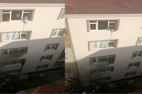 Azərbaycanlı hamilə qadını qonşuları yanan binadan kəndirlə çıxardılar - VİDEO