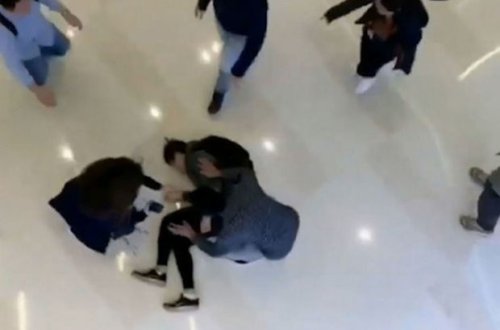 Polisdən qaçmaq üçün özünü binadan atdı - VİDEO