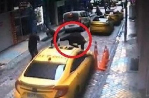 Şəkilçəkən ikinci mərtəbədən taksinin üzərinə çırpıldı